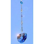 Blue Heart Crystal Light Catcher with Delicately Beaded Strand
Blue Heart Crystal Light Catcher with Delicately Beaded Strand
Please Click the image for more information.